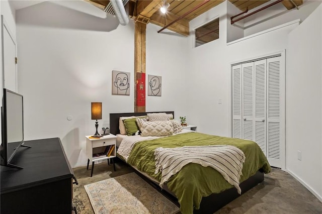19 Hilliard St SE Unit 13, Atlanta, GA 30312 - bedroom with a closet, carpet floors, and baseboards