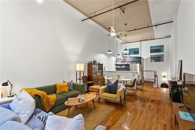 19 Hilliard St SE Unit 13, Atlanta, GA 30312 - living area with a towering ceiling and hardwood / wood-style floors