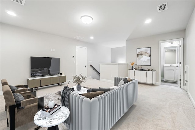 791 Belrose Dr, Smyrna, GA 30080 - living area featuring light carpet, recessed lighting, and baseboards