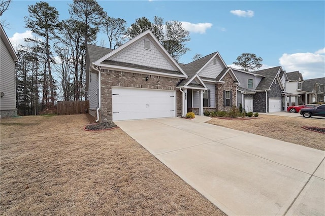 craftsman-style house featuring an attached garage and concrete driveway