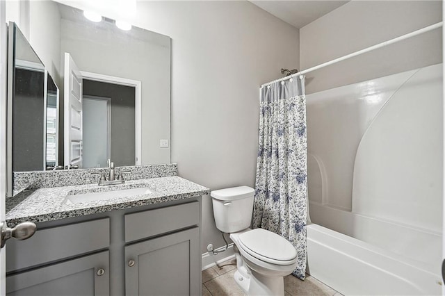 full bathroom with shower / bathtub combination with curtain, toilet, vanity, tile patterned flooring, and baseboards