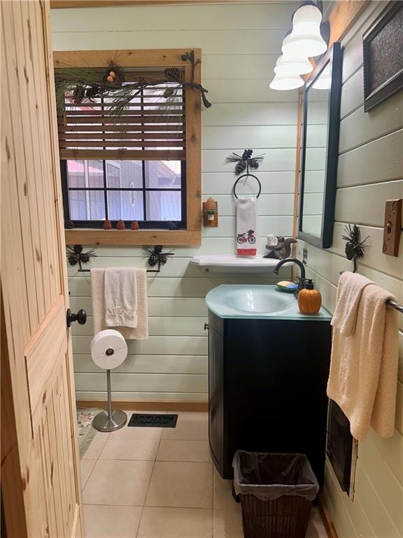 226 Hawk Hill Ln, Lakemont, GA 30552 - bathroom featuring vanity, tile patterned flooring, and wood walls