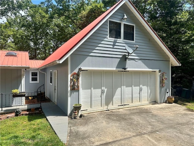 226 Hawk Hill Ln, Lakemont, GA 30552 - view of side of home featuring driveway and metal roof