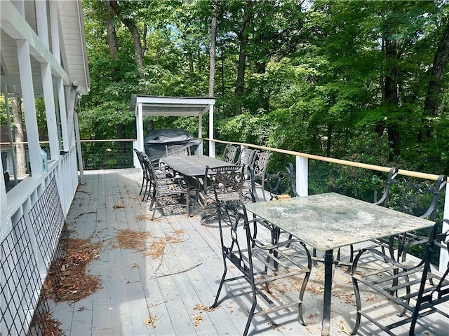 226 Hawk Hill Ln, Lakemont, GA 30552 - wooden terrace with outdoor dining space