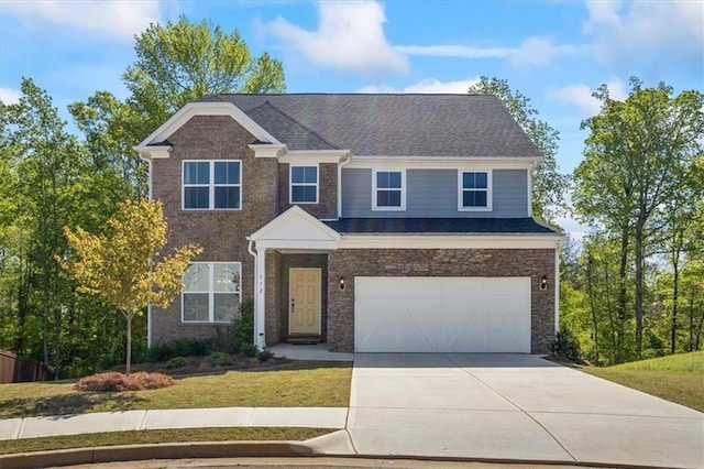 312 Wichita Way, Mcdonough, GA 30253 - view of front of house with concrete driveway, an attached garage, and a front yard