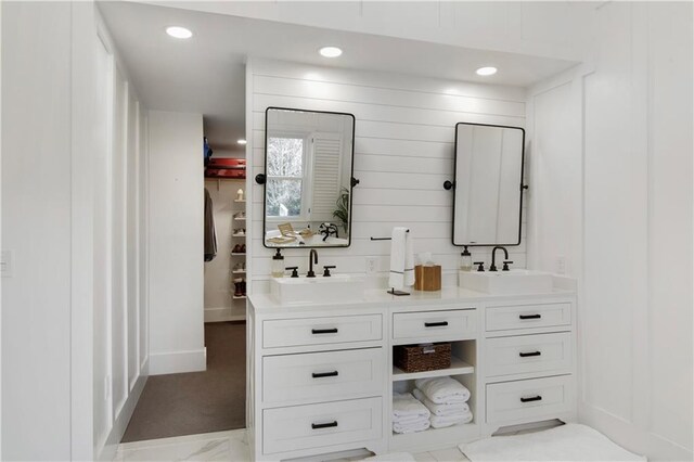 bedroom featuring crown molding, a tray ceiling, recessed lighting, and baseboards