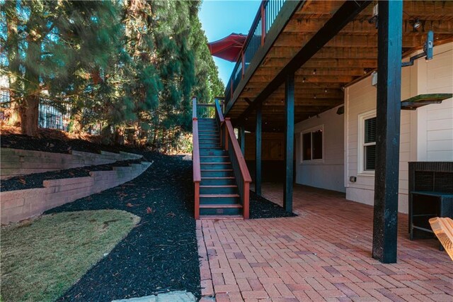 corridor featuring ornamental molding, recessed lighting, carpet flooring, and baseboards