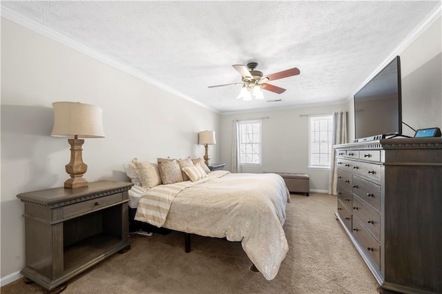 bedroom featuring light carpet, a textured ceiling, and crown molding