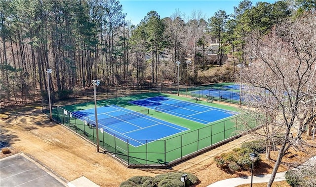 view of sport court with fence