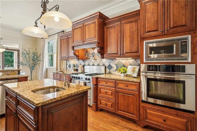 1211 Thornwell Dr, Brookhaven, GA 30319 - kitchen featuring appliances with stainless steel finishes, a sink, light stone countertops, tasteful backsplash, and light wood finished floors