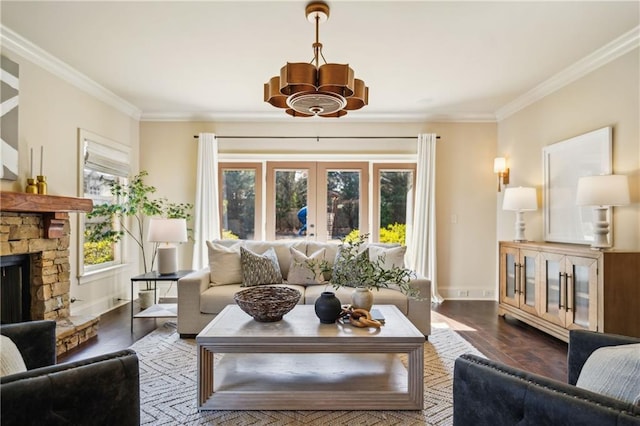 1211 Thornwell Dr, Brookhaven, GA 30319 - living room featuring a chandelier, a stone fireplace, dark wood finished floors, ornamental molding, and french doors