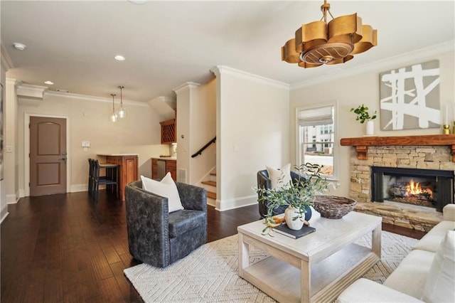 1211 Thornwell Dr, Brookhaven, GA 30319 - living room with a chandelier, baseboards, stairs, ornamental molding, and a stone fireplace