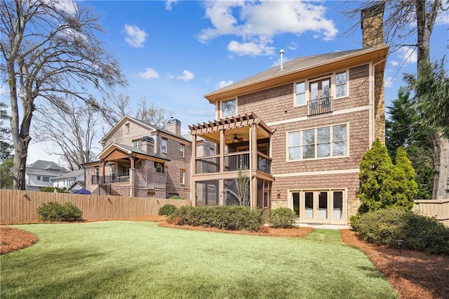 1211 Thornwell Dr, Brookhaven, GA 30319 - rear view of property featuring a balcony, a ceiling fan, french doors, and a chimney