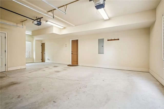 1211 Thornwell Dr, Brookhaven, GA 30319 - garage featuring electric panel and a garage door opener