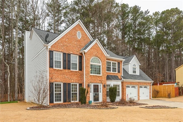 view of front of home with a garage