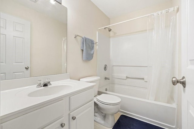 full bathroom with vanity, shower / bath combo, and toilet