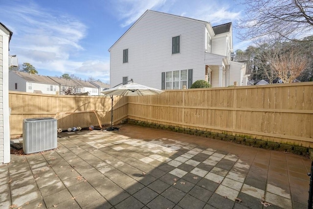 view of patio featuring central AC and a deck