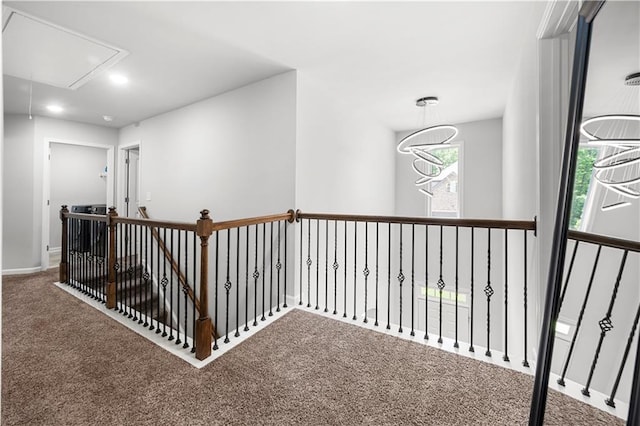 corridor featuring attic access, carpet floors, an upstairs landing, recessed lighting, and baseboards