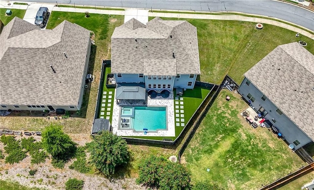 drone / aerial view of a pool area