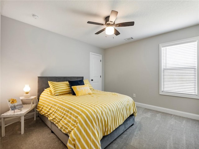 132 Mcmillian Ct, Winder, GA 30680 - bedroom with carpet, baseboards, and ceiling fan