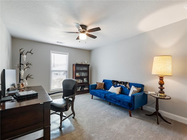 132 Mcmillian Ct, Winder, GA 30680 - office area featuring carpet flooring, ceiling fan, baseboards, and a textured ceiling