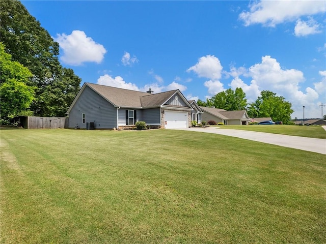 132 Mcmillian Ct, Winder, GA 30680 - view of front of home with driveway, a garage, and central AC