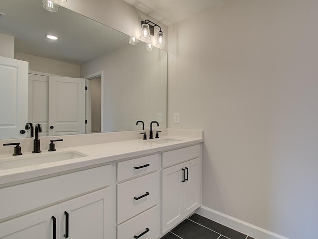 bathroom with vanity and tile patterned flooring