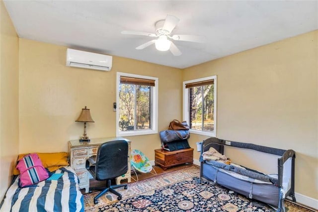 office with ceiling fan and a wall mounted AC