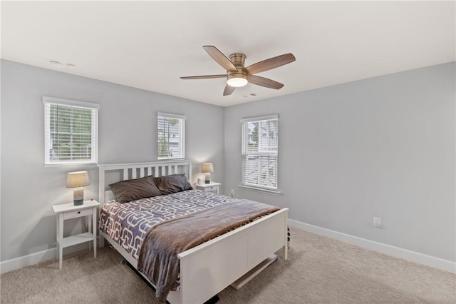 bedroom featuring baseboards, carpet, and ceiling fan