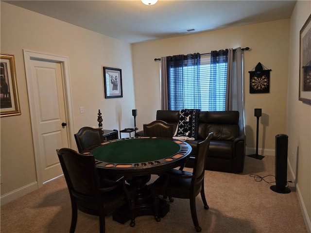 dining room featuring carpet floors