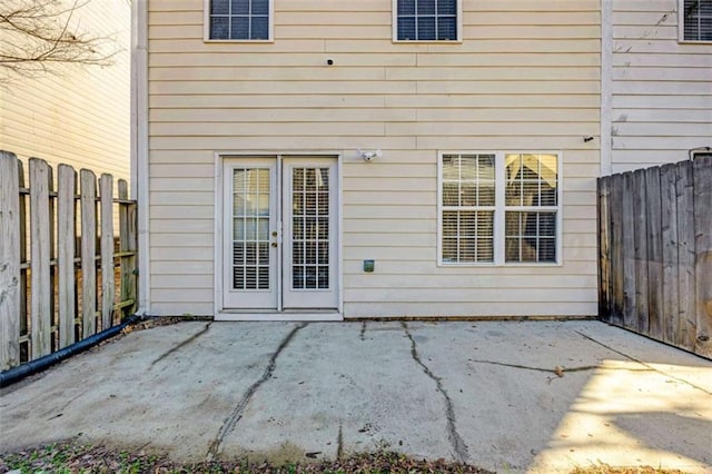 doorway to property with a patio area