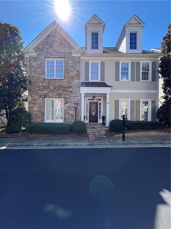 view of front facade with stone siding