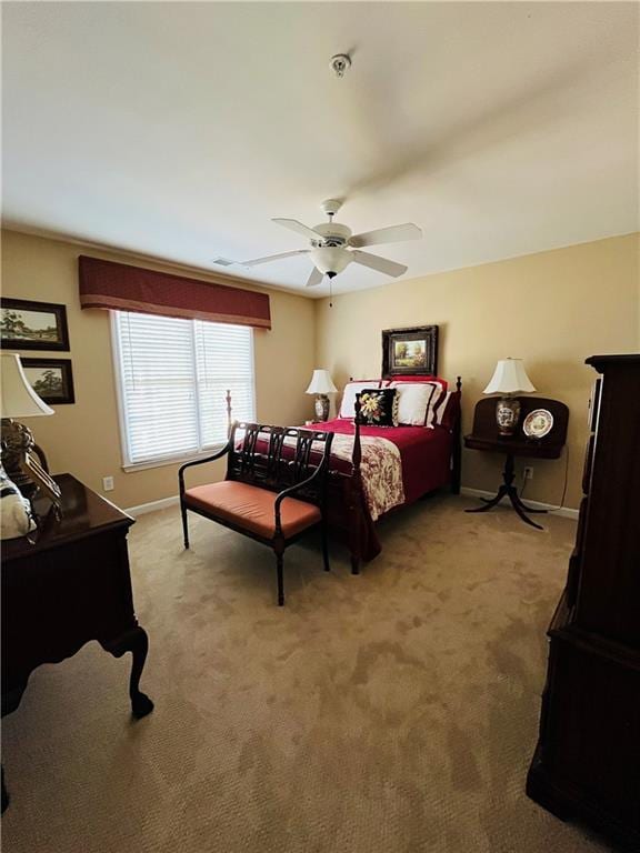 bedroom featuring light carpet, visible vents, a ceiling fan, and baseboards