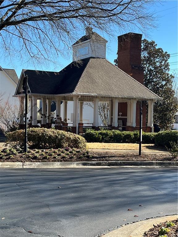 view of front of property with a chimney