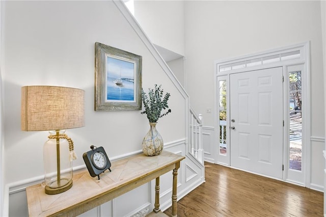 foyer entrance with dark wood-type flooring