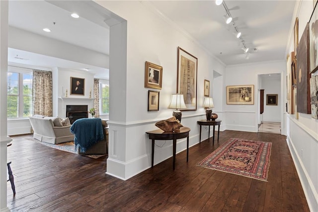 3101 Howell Mill Rd NW Unit 301, Atlanta, GA 30327 - hallway featuring hardwood / wood-style flooring, track lighting, and ornamental molding