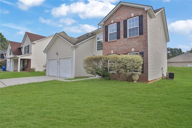 view of front facade with a garage, central air condition unit, and a front yard