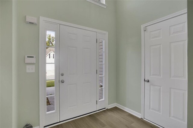 entrance foyer with light wood-type flooring