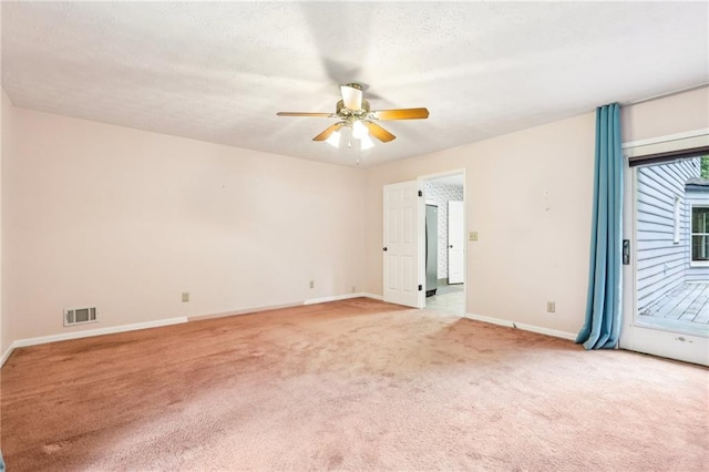 8464 Pleasant Hill Rd, Lithonia, GA 30058 - spare room with light carpet, a ceiling fan, and baseboards