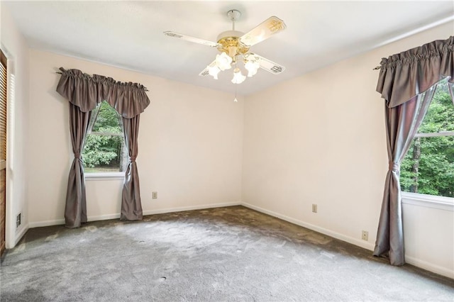 8464 Pleasant Hill Rd, Lithonia, GA 30058 - spare room with carpet, a ceiling fan, and baseboards