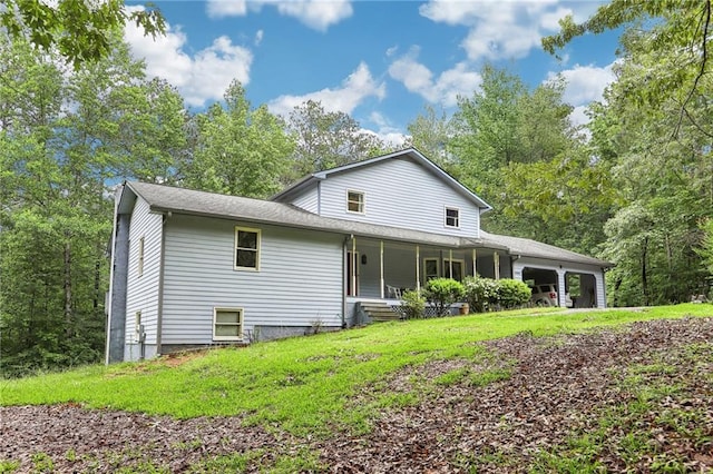 8464 Pleasant Hill Rd, Lithonia, GA 30058 - view of front of home with a garage, a porch, and a front yard