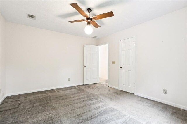 8464 Pleasant Hill Rd, Lithonia, GA 30058 - unfurnished room with ceiling fan, carpet flooring, and baseboards