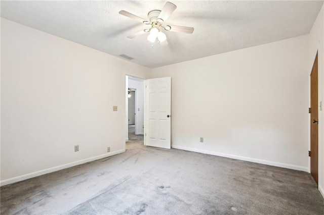 8464 Pleasant Hill Rd, Lithonia, GA 30058 - unfurnished bedroom featuring carpet floors, baseboards, ceiling fan, and a textured ceiling