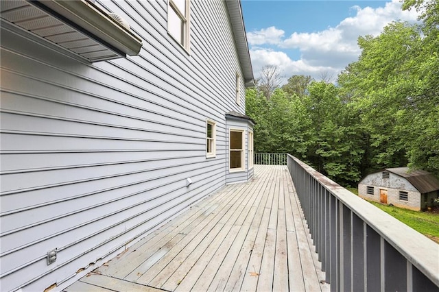 8464 Pleasant Hill Rd, Lithonia, GA 30058 - wooden deck featuring an outdoor structure