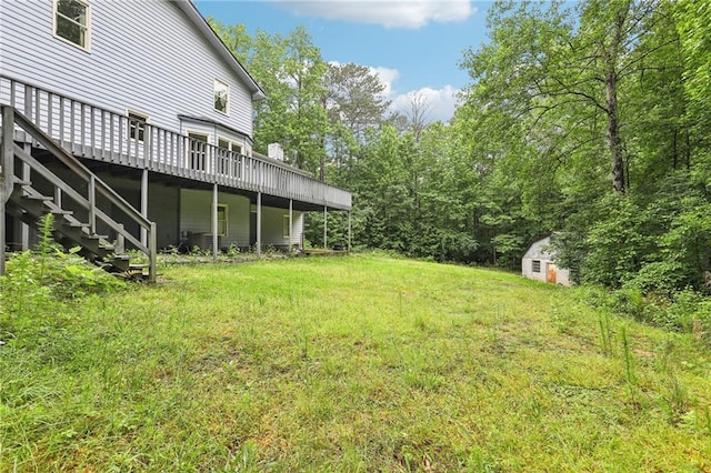 8464 Pleasant Hill Rd, Lithonia, GA 30058 - view of green lawn featuring a deck and stairs