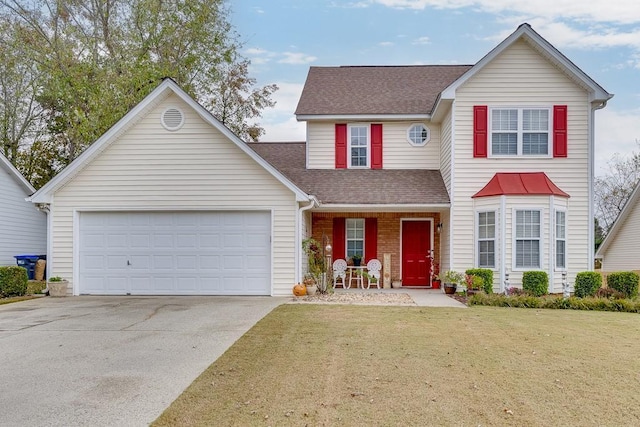 front facade featuring a garage and a front lawn