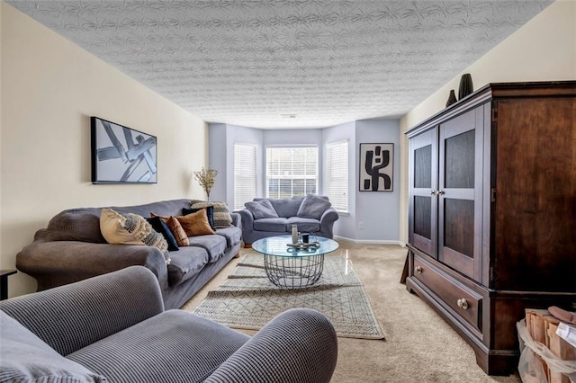 living area featuring light colored carpet and baseboards