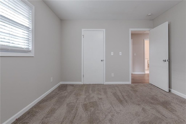 unfurnished bedroom featuring carpet floors