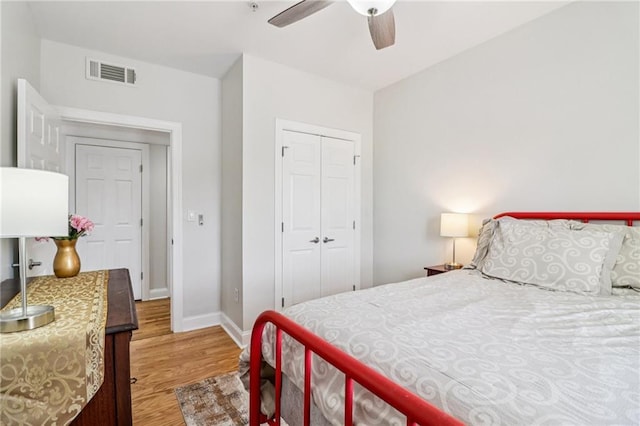 2465 Main St Unit 201, Atlanta, GA 30344 - bedroom with wood finished floors, a closet, and ceiling fan