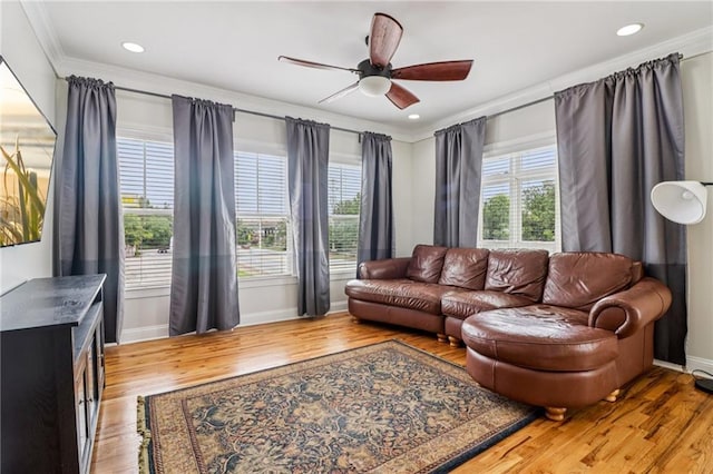 2465 Main St Unit 201, Atlanta, GA 30344 - living area featuring crown molding, light wood-style floors, a ceiling fan, and recessed lighting